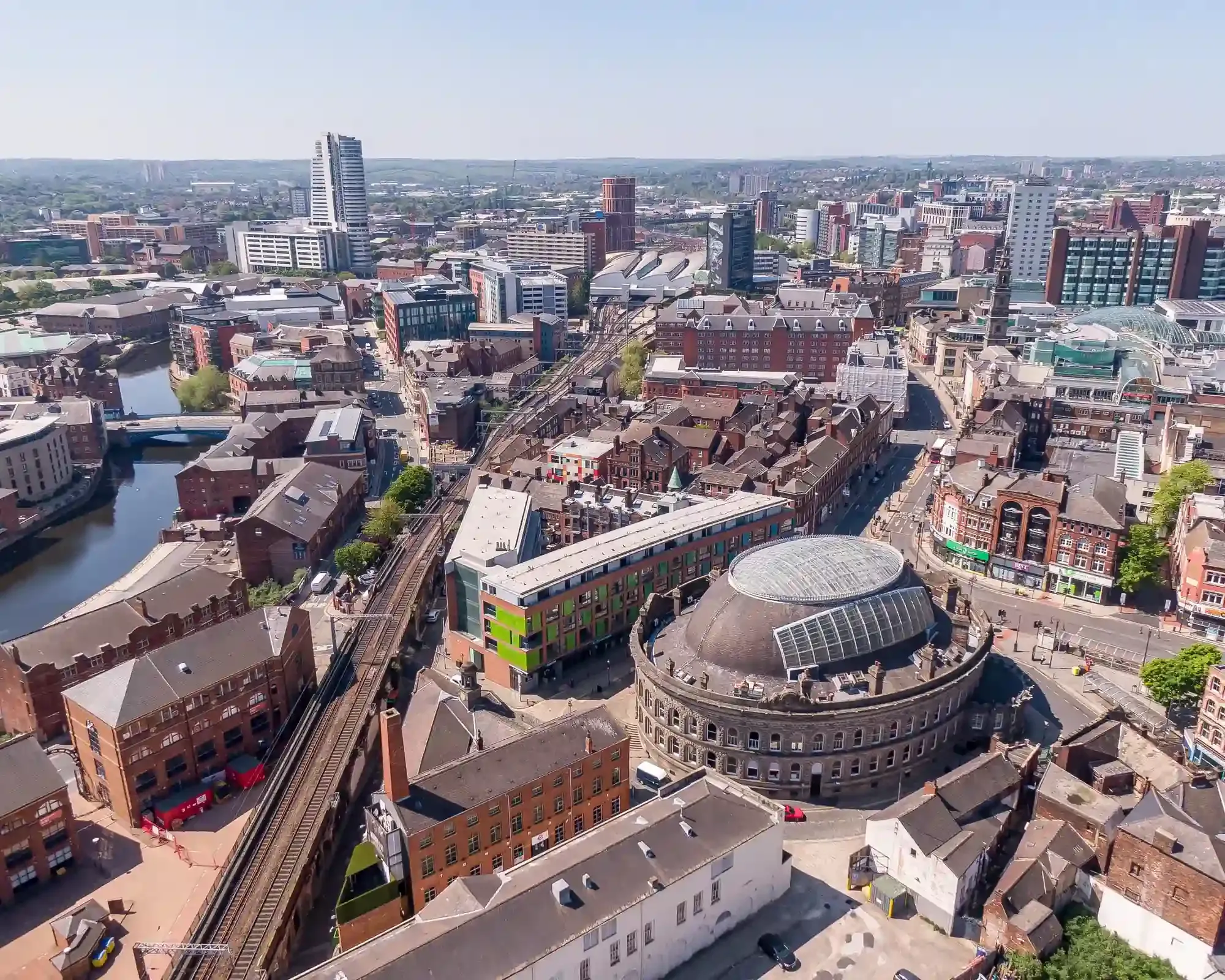 Aerial view of Leeds Corn Exchange and city centre, home to our conveyancing solicitors